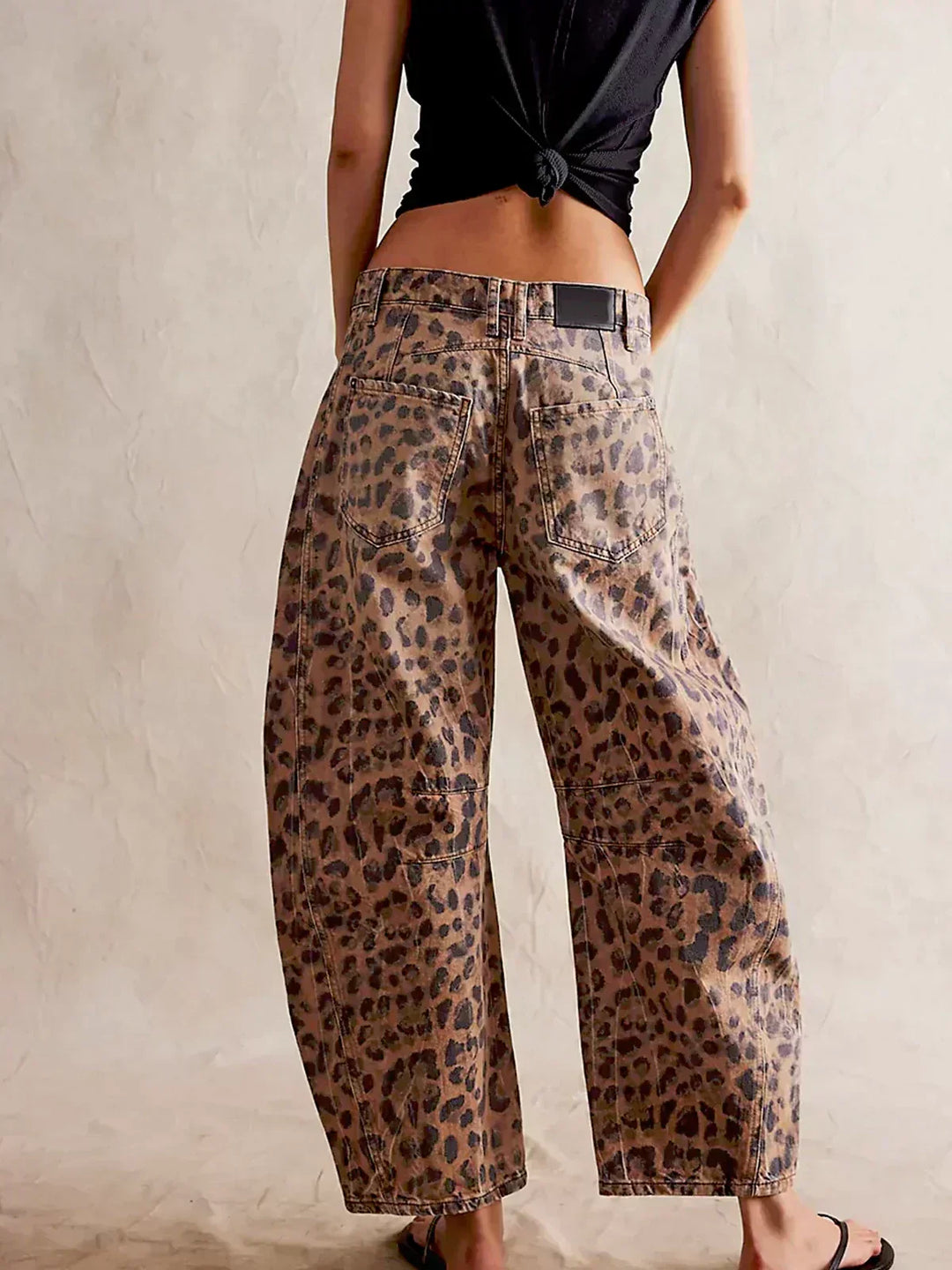 womens-denim-jeans-with-allover-animal-print-and-barrel-legs-3
